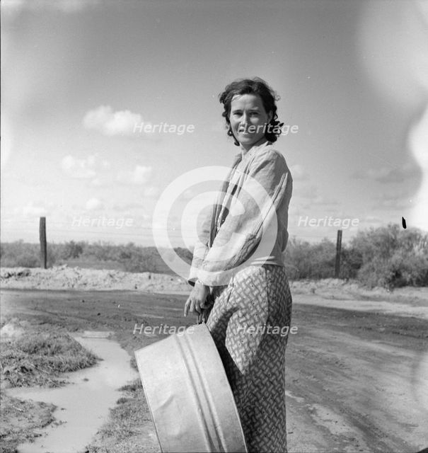 In a migratory camp, California, 1936. Creator: Dorothea Lange.