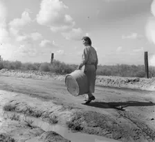 In a migratory labor camp, California, 1936. Creator: Dorothea Lange