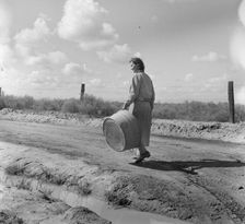In a migratory labor camp, California, 1936. Creator: Dorothea Lange
