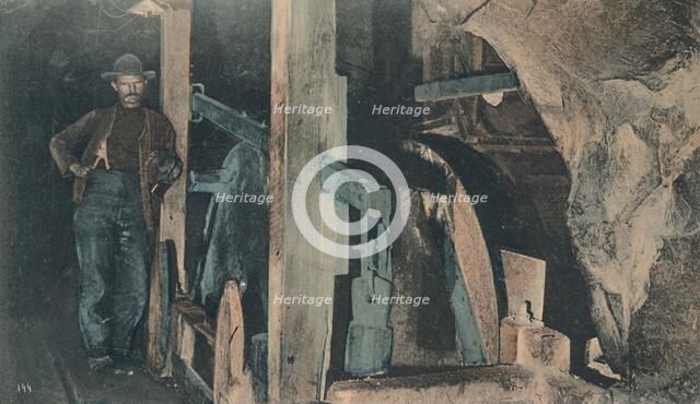 'In a Rand Mine - An end Tipler', early 20th century. Creator: Unknown.