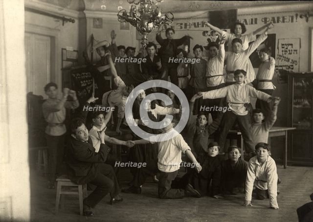In dorm - Drama club (GOSET artist - Comrade Shteiman), Jewish printing school, Moscow, 1922-1923. Creator: Unknown.