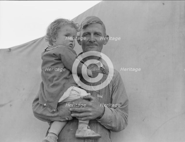 In Farm Security Administration (FSA) migratory labor camp, Brawley, Imperial Valley, 1939. Creator: Dorothea Lange.