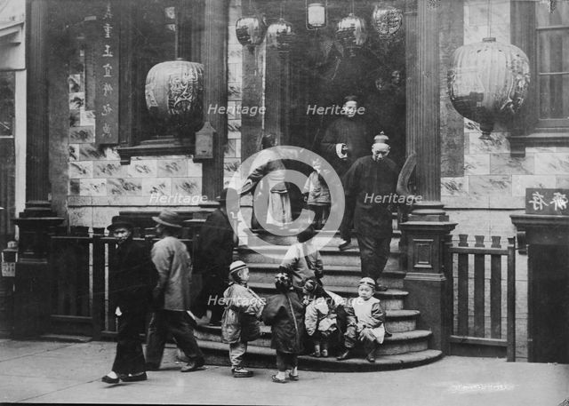 In front of the Joss House, Chinatown, San Francisco, between 1896 and 1906. Creator: Arnold Genthe.