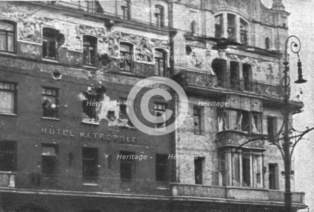 In Soviet Russia; Facade of the Hotel Metropole, in Moscow, cannoned and rifled...1917. Creator: Unknown.