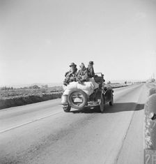 In search of employment as pea pickers, on U.S. 80, Imperial Valley, California, 1939. Creator: Dorothea Lange