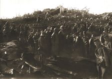 In Recaptured Territory; The evening of October 23, 1917: gathering German prisoners,... 1917. Creator: Unknown