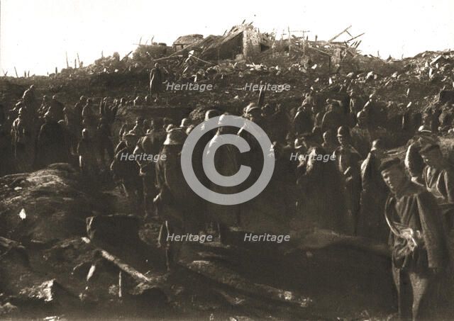 In Recaptured Territory; The evening of October 23, 1917: gathering German prisoners,... 1917. Creator: Unknown.