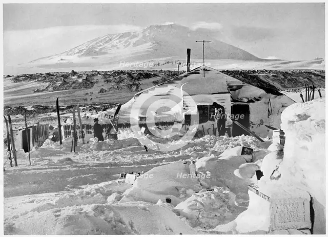 'In Winter Quarters Working on Maps and Records', Antarctica, 1911-1912. Creator: Herbert Ponting.