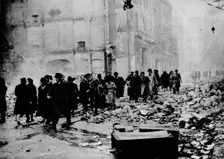 In the morning, work as usual. After a big raid, the way to the office is knee-deep in rubble. Lond