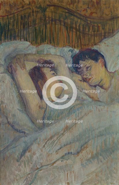 In the bed.