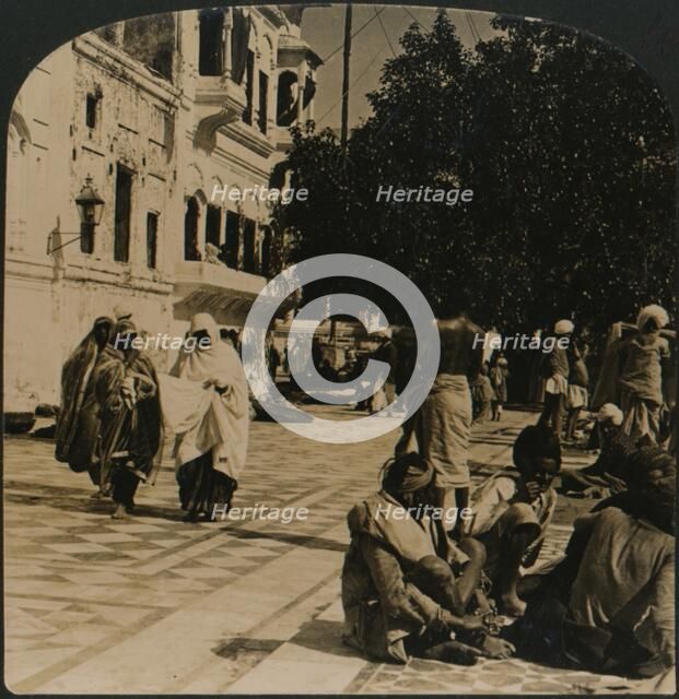 'In the courtyard of the Golden Temple. Amritsar, India', 1907. Artist: Unknown.