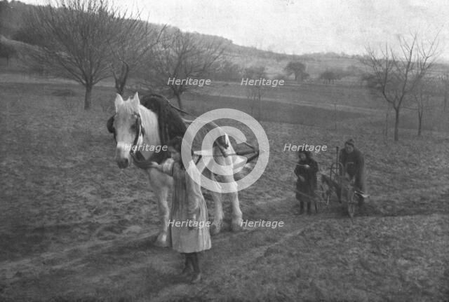 In the French countryside; While father is away fighting!, 1917. Creator: Unknown.