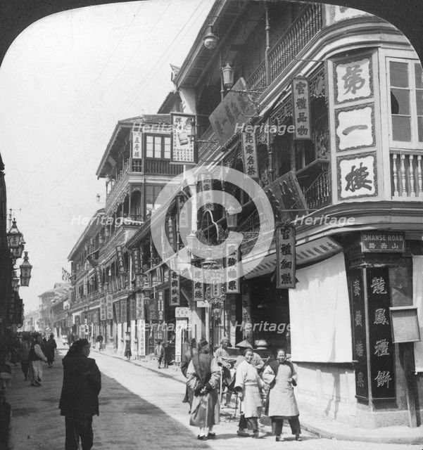 In the street of the tea houses, Shanghai, China, 1901.  Artist: Underwood & Underwood