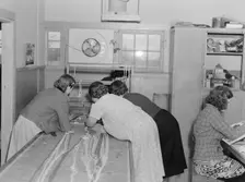 In the sewing room, Shafter camp for migrants (FSA), California, 1938. Creator: Dorothea Lange