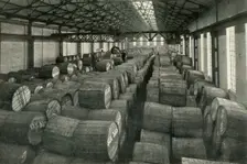 "In the Warehouses of the P.L.A. with their Accommodation for a Million Tons" -Tobacco... 1937. Creator: Unknown