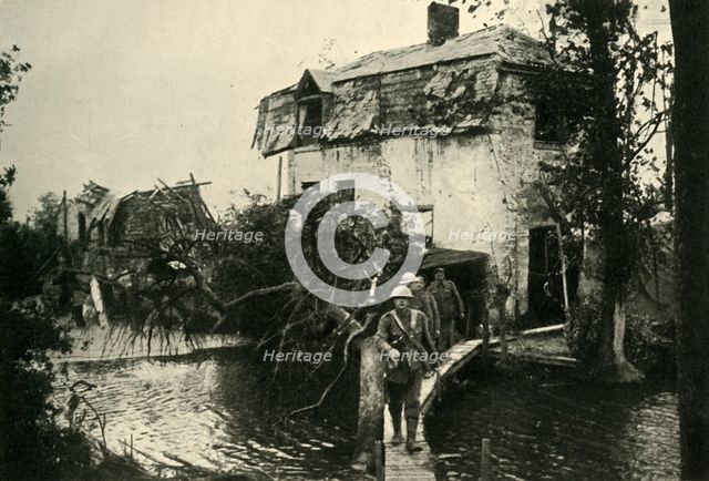 'In the Ypres Salient: British troops leaving their billets...', First World War, 1917, (c1920). Creator: Unknown.