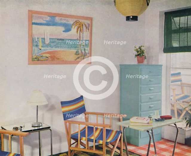 'In this small London flat use has been made of inexpensive furniture', 1940. Artist: Unknown.