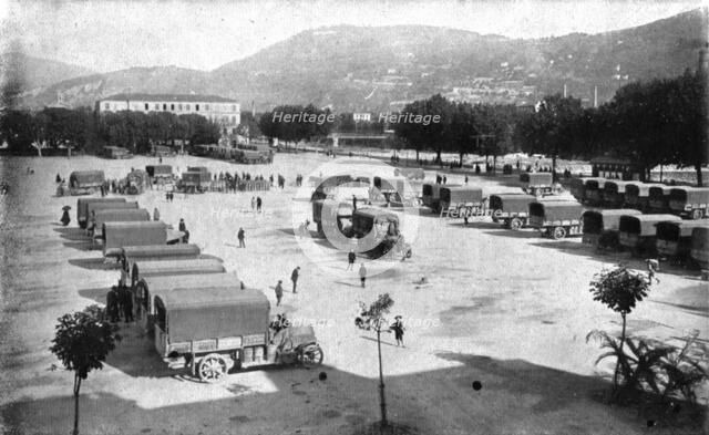 Inter-allied Support; Assembling, on the Place d'Armes in Nice, automobile trucks..., 1917. Creator: Pelanda.