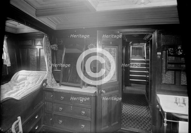 Interior of cabin on steam yacht 'Venetia', 1920. Creator: Kirk & Sons of Cowes.