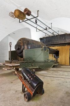 Interior of casement with massive 38 ton gun and equipment, Hurst Castle, Hampshire, 2012. Artist: Historic England Staff Photographer