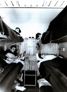 Interior of a traveler car wagon with bunks, 1950