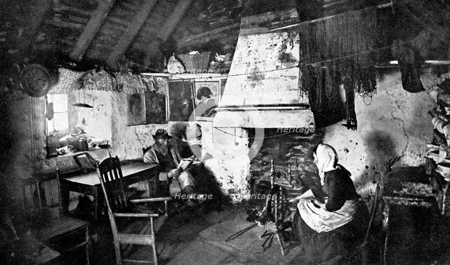 Interior of a crofter's cottage, Shetland, Scotland, 1924-1926.Artist: Valentine & Sons Ltd