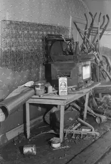 Interior of a farmhouse near Ridgeley, Tennessee, after the 1937 flood waters had subsided, 1937. Creator: Walker Evans