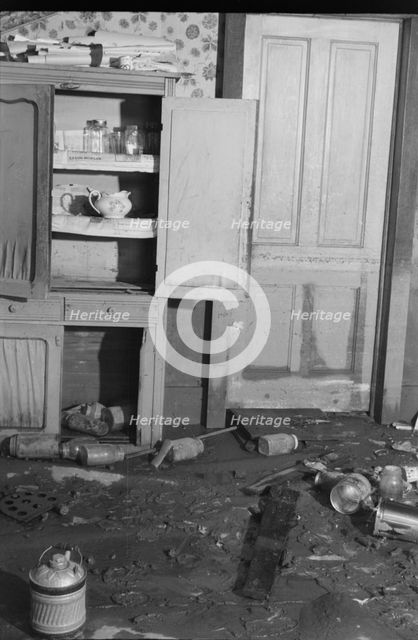 Interior of a farmhouse near Ridgeley, Tennessee, after the 1937 flood waters had subsided, 1937. Creator: Walker Evans.
