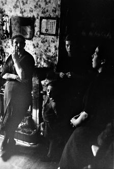 Interior of a London slum, c1900. Creator: Unknown