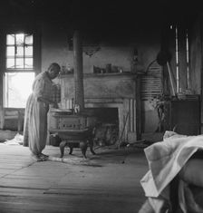 Interior of a plantation house now vacant, Greene County, Georgia, 1937. Creator: Dorothea Lange