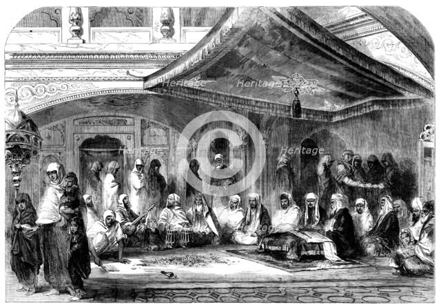 Interior of a Sikh Temple at Umritzir - reading the Grunt'h, 1858. Creator: Unknown.