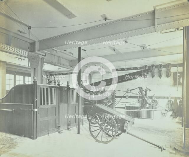 Interior of appliance room, Northcote Road Fire Station, Battersea, London, 1906. Artist: Unknown.