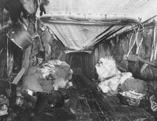 Interior of Eskimo hut, 1916. Creator: Lomen Brothers