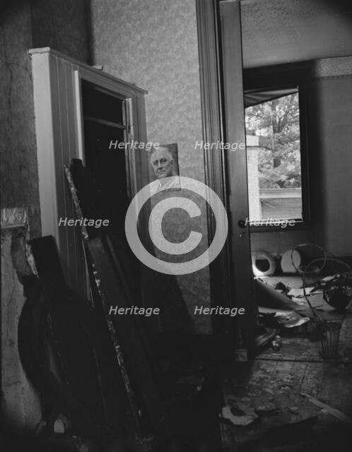 Interior of house being wrecked on Independence Avenue, Washington, D.C, 1942. Creator: Gordon Parks.