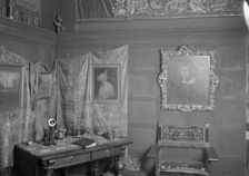 Interior of one of Arnold Genthe's San Francisco studios, between 1896 and 1911. Creator: Arnold Genthe