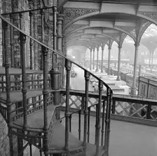 Interior of Liverpool Street Station showing a cast iron spiral staircase, 1960-1972. Creator: John Gay