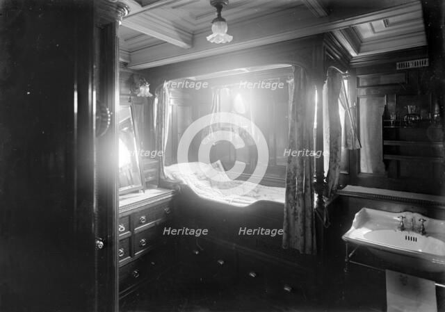 Interior of midships cabin on steam yacht 'Venetia', 1920. Creator: Kirk & Sons of Cowes.