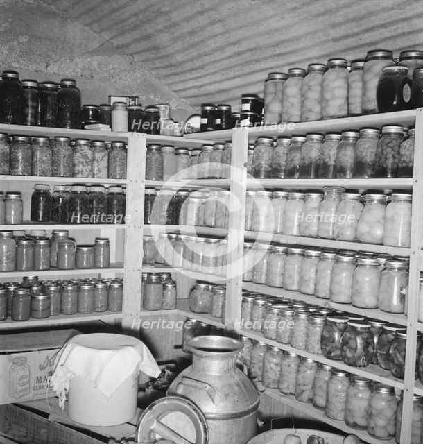 Interior of Mrs. Botner's storage cellar, Nyssa Heights, Malheur County, Oregon, 1939. Creator: Dorothea Lange.