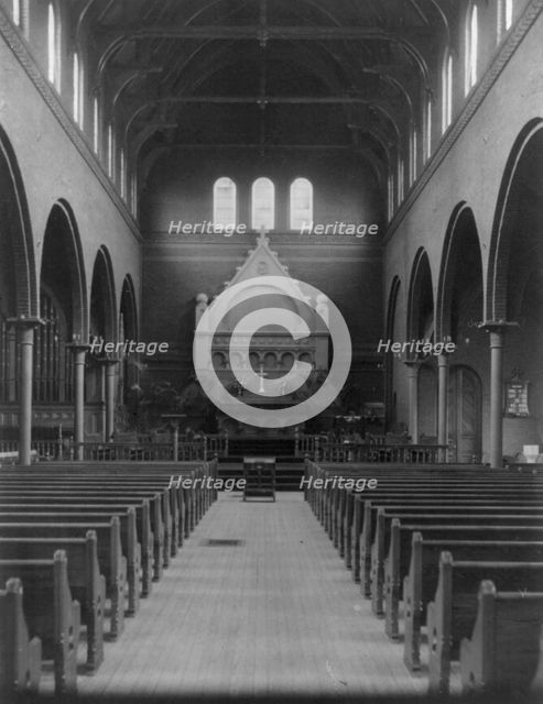 Interior of St. Marks church, Washington, D.C. - view down center aisle toward altar, c1900. Creator: Frances Benjamin Johnston.