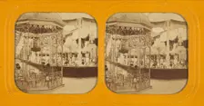 Interior of possibly the 1867 Paris Exposition displaying lighting fixtures, about 1867. Creator: Unknown