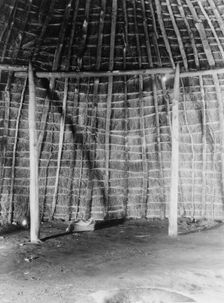 Interior of Wichita grass-house, c1927. Creator: Edward Sheriff Curtis