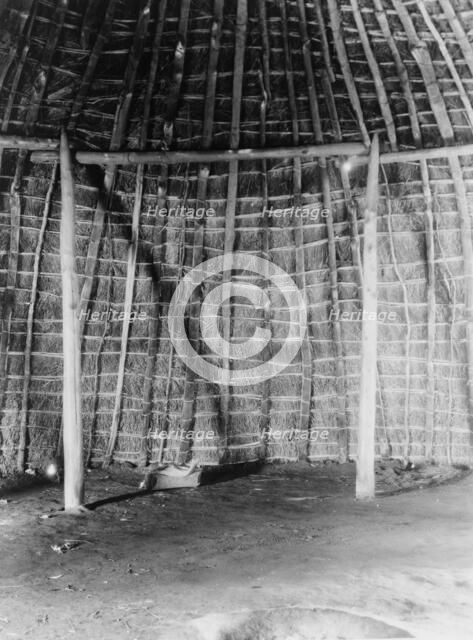 Interior of Wichita grass-house, c1927. Creator: Edward Sheriff Curtis.