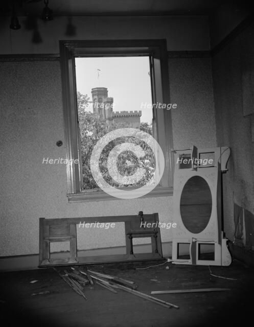 Interior of wrecked houses on Independence Avenue, Washington, D.C, 1942. Creator: Gordon Parks.