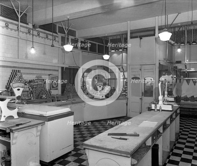 Interior of the Butchery Department, Barnsley Co-op, South Yorkshire, 1956. Artist: Michael Walters