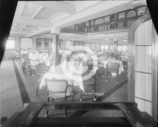 Interior shot of dining room, possibly the Royal Yacht Squadron, Cowes. Creator: Kirk & Sons of Cowes.