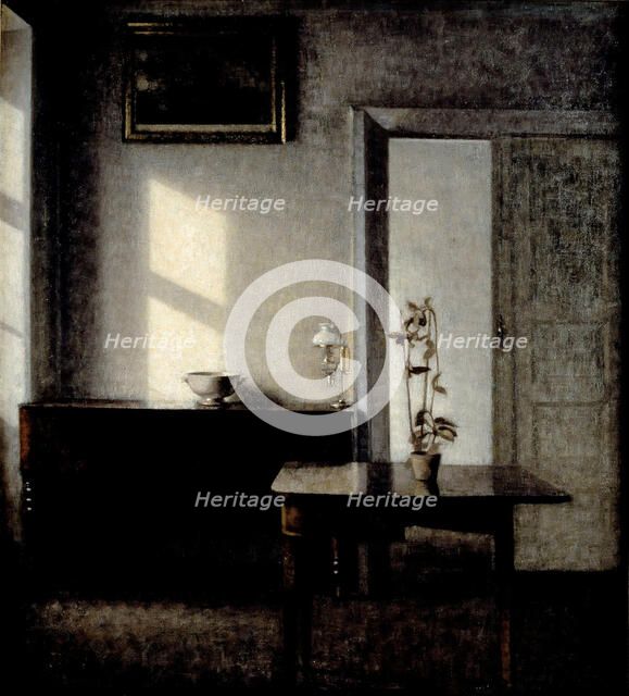 Interior with potted plant on card table, 1910-1911. Artist: Hammershøi, Vilhelm (1864-1916)