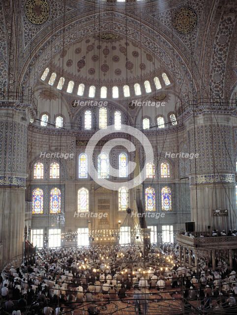 Interior view of the Blue Mosque in Istanbul during Friday prayers.