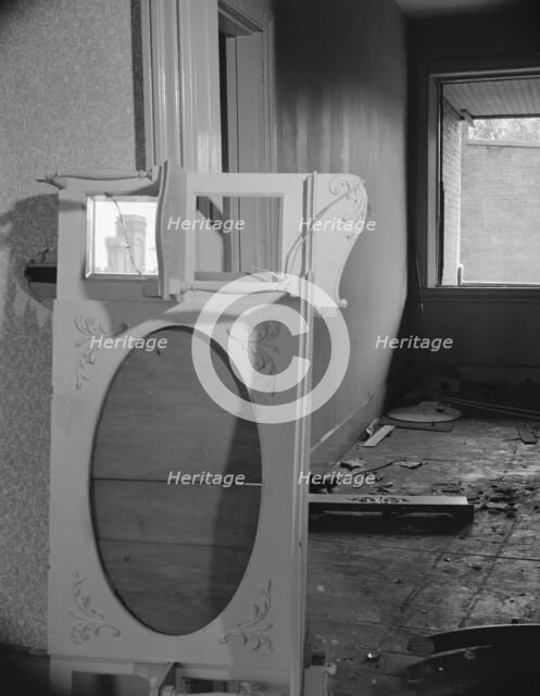 Interiors of wrecked homes on Independence Avenue..., Washington, D.C, 1942. Creator: Gordon Parks.