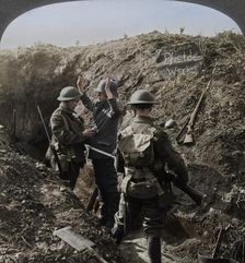 Interrogating a German prisoner to obtain information, World War I, 1914-1918. Artist: Realistic Travels Publishers