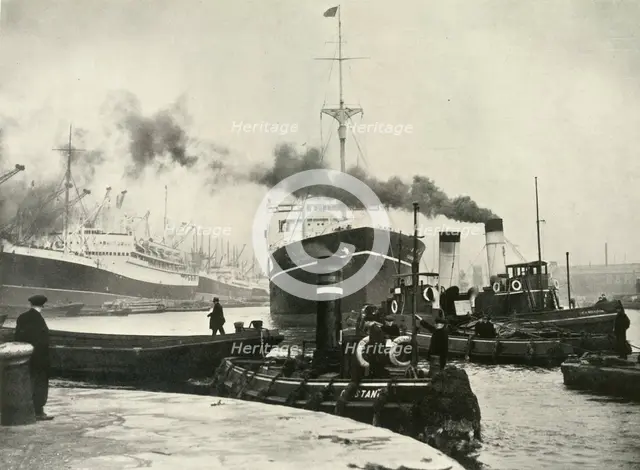 "Into the Arena Where Ships Made Their Unending Entrances and Exits" A Vessel Docking at...', 1937. Creator: Fox.